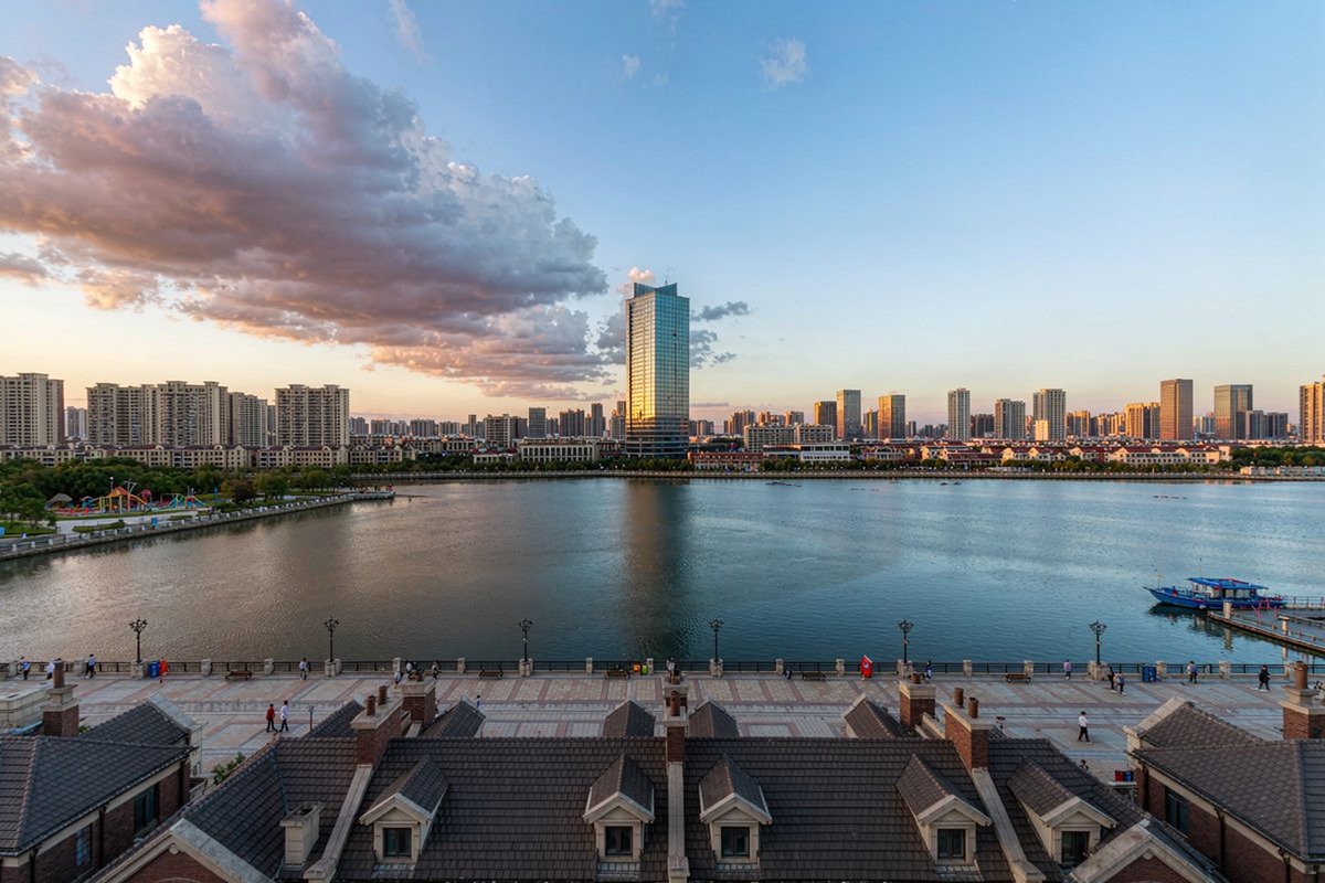 Riverside promenade overlooking the skyline
